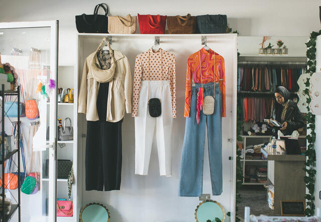 A display of arranged outfits in Nour's shop.